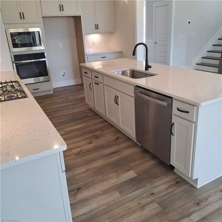 Kitchen - 6756 Honeycutt Reserve Dr, Oak Ridge, NC 27310 photo 2 of 3