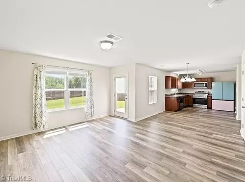Living - 136 Kutter Dr, Elon, NC 27244 photo 2 of 3