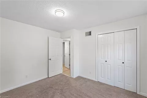 Bedroom - 300 Main St E #E, Pilot Mountain, NC 27041 photo 3 of 3