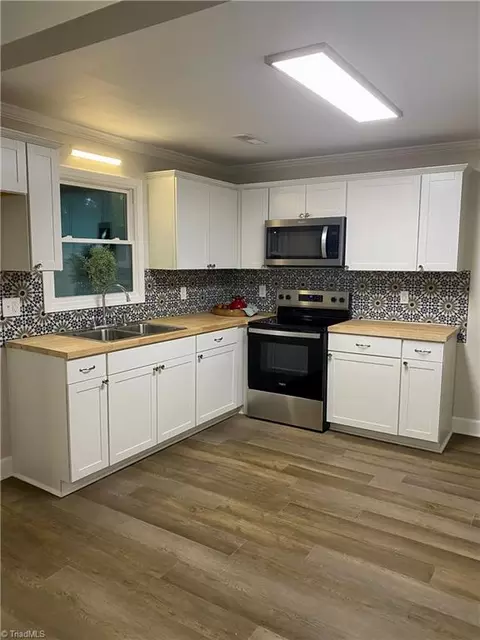 Kitchen - 12448 Trinity Rd, Trinity, NC 27370 photo 1 of 2