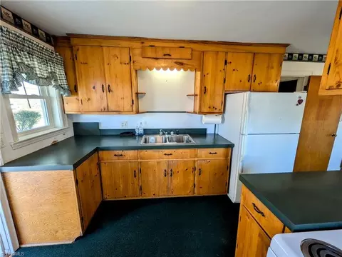 Kitchen - 220 King St W, King, NC 27021 photo 1 of 3