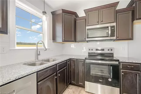 Kitchen - 139 Knight Farm Rd, Stokesdale, NC 27357 photo 3 of 3