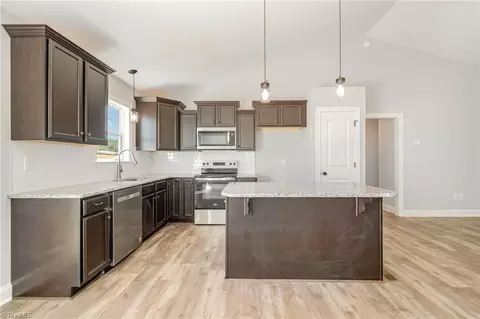 Kitchen - 139 Knight Farm Rd, Stokesdale, NC 27357 photo 2 of 3