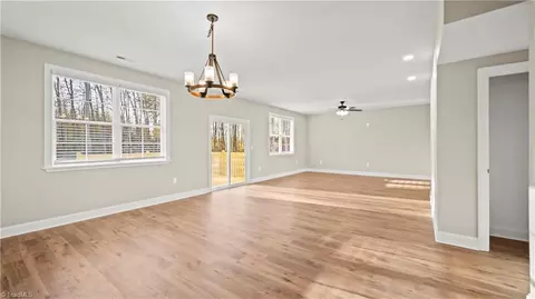 Living - 8189 Rylan Dr, Browns Summit, NC 27214 photo 6 of 7