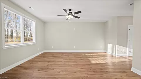 Living - 8189 Rylan Dr, Browns Summit, NC 27214 photo 4 of 7