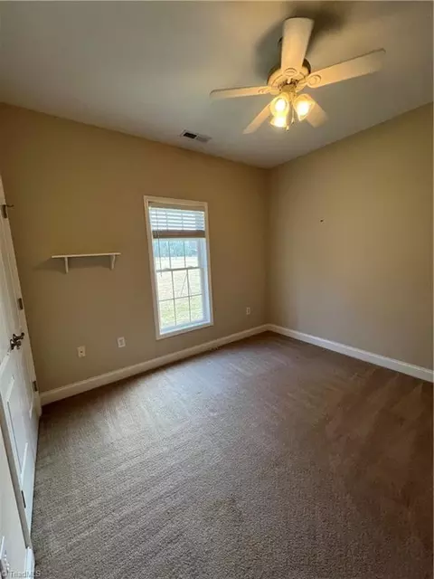 Bedroom - 237 Hartgrove Rd, King, NC 27021 photo 2 of 4