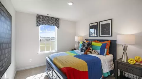 Bedroom - 140 E Farm Loop, Stokesdale, NC 27357 photo 7 of 7