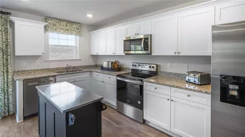 Kitchen - 140 E Farm Loop, Stokesdale, NC 27357 photo 2 of 2