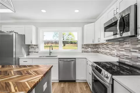 Kitchen - 909 King St E, King, NC 27021 photo 3 of 4