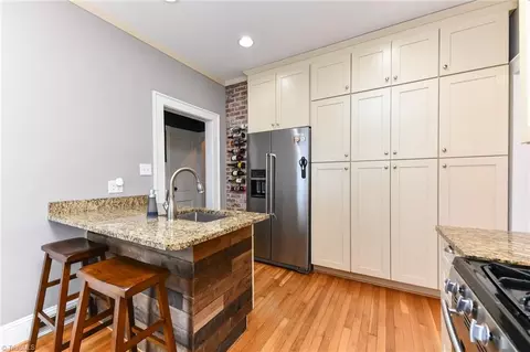 Kitchen - 407 Colonial Dr, High Point, NC 27262 photo 3 of 4