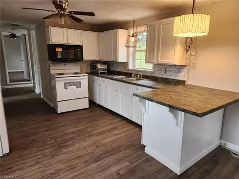 Kitchen - 8997 Pine St W, Lowgap, NC 27024 photo 2 of 2