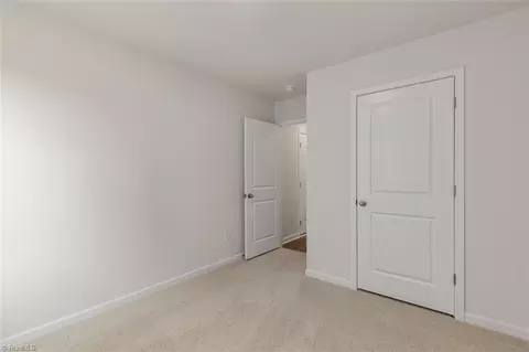 Bedroom - 187 E Farm Loop, Stokesdale, NC 27357 photo 6 of 13