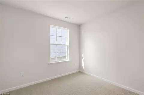 Bedroom - 187 E Farm Loop, Stokesdale, NC 27357 photo 5 of 13