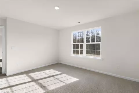 Bedroom - 187 E Farm Loop, Stokesdale, NC 27357 photo 3 of 13