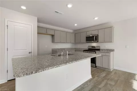 Kitchen - 187 E Farm Loop, Stokesdale, NC 27357 photo 2 of 2