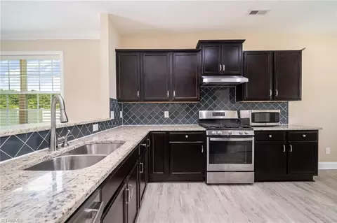 Kitchen - 2209 Starfall Dr, Colfax, NC 27235 photo 2 of 2
