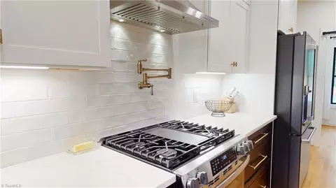Kitchen - 377 Mcintosh Dr, Lowgap, NC 27024 photo 3 of 6