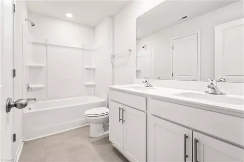7023 Eclipse Trl, Whitsett, NC 27377 photo 11