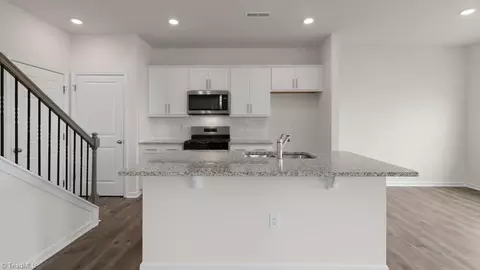 7031 Eclipse Trl, Whitsett, NC 27377 photo 11