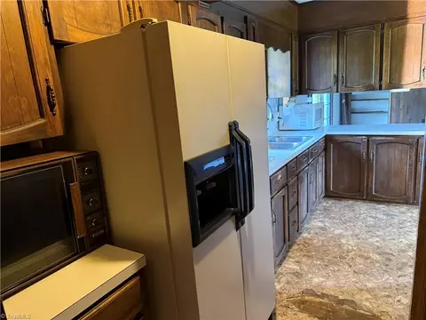 Kitchen - 126 Norval Lowe Rd, Lowgap, NC 27024 photo 2 of 2