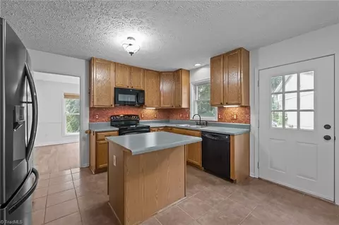 Kitchen - 686 Mock Rd, High Point, NC 27265 photo 2 of 3
