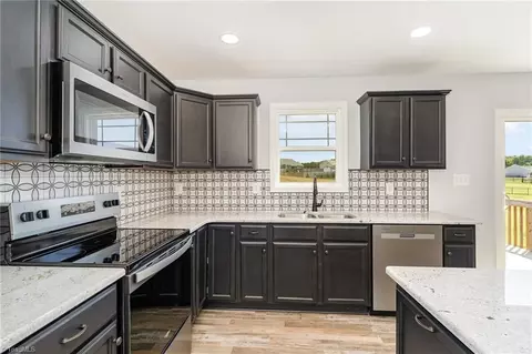 Kitchen - 115 Knight Farm Rd, Stokesdale, NC 27357 photo 5 of 6
