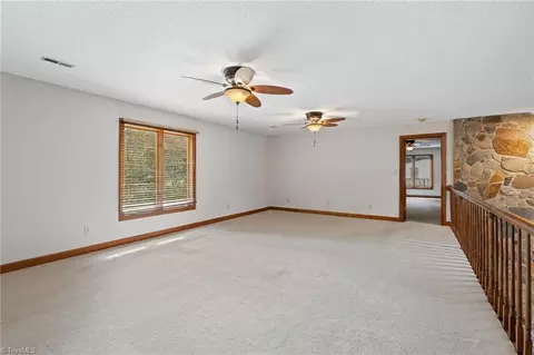 Living - 8324 Meadows Rd, Oak Ridge, NC 27310 photo 11 of 12