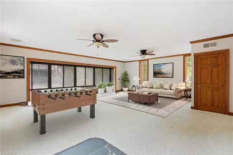 Living - 8324 Meadows Rd, Oak Ridge, NC 27310 photo 9 of 12