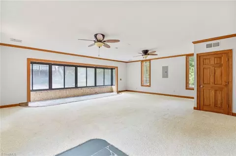 Living - 8324 Meadows Rd, Oak Ridge, NC 27310 photo 8 of 12