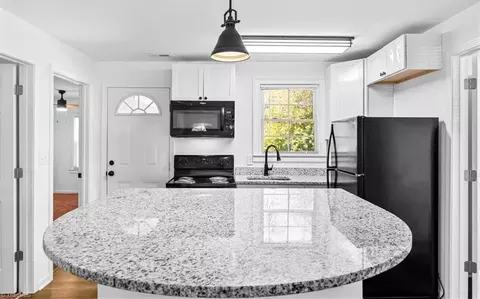 Kitchen - 1423 Commerce Ave E, High Point, NC 27260 photo 2 of 3