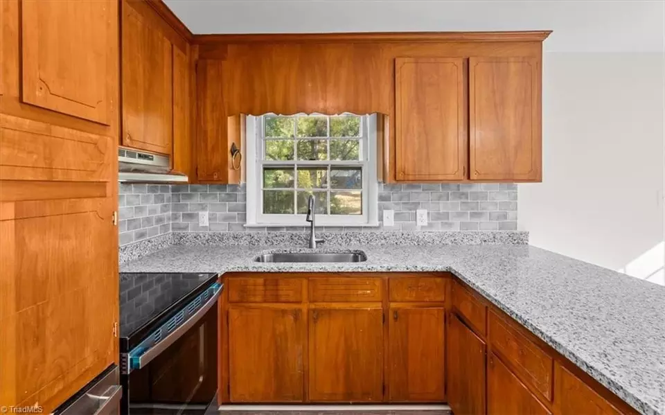 Kitchen - 2108 Carpenter St, Greensboro, NC 27403 photo 2 of 2