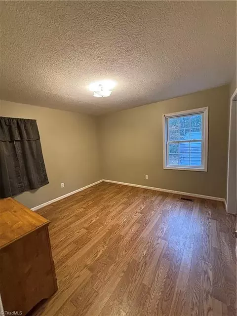 Bedroom - 380 Huffman River Ln, Purlear, NC 28665 photo 2 of 2