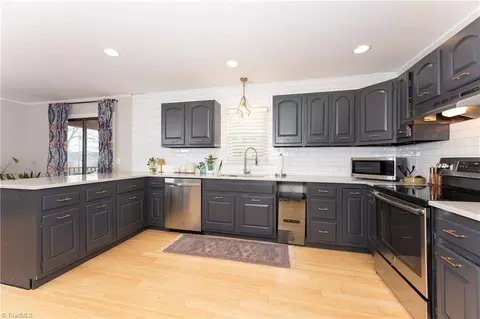 Kitchen - 399 Comanche Dr, Advance, NC 27006 photo 2 of 3