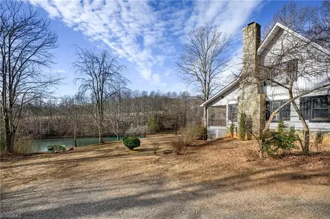 Exterior - 655 Wind Ridge Ln, Dobson, NC 27017 photo 3 of 14
