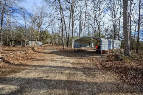 Exterior - 655 Wind Ridge Ln, Dobson, NC 27017 photo 10 of 14