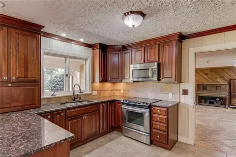 Kitchen - 122 Pine St, King, NC 27021 photo 2 of 4