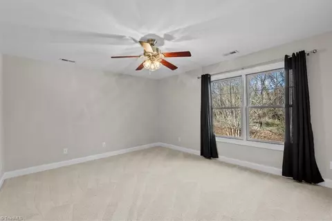 Bedroom - 5936 Tarleton Dr, Oak Ridge, NC 27310 photo 3 of 6