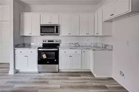 Kitchen - 604 Oliver St, Ramseur, NC 27316 photo 2 of 7