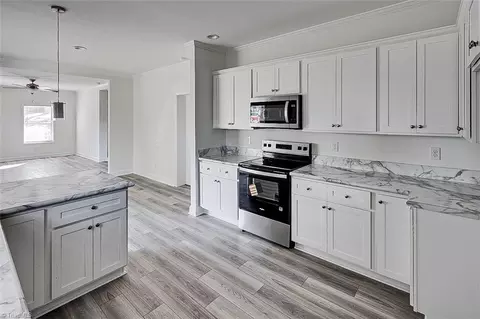 Kitchen - 604 Oliver St, Ramseur, NC 27316 photo 3 of 7