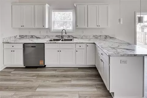 Kitchen - 604 Oliver St, Ramseur, NC 27316 photo 5 of 7