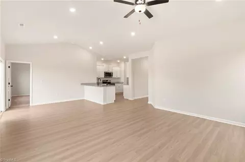 Living - 225 Macintosh Dr, King, NC 27021 photo 3 of 4