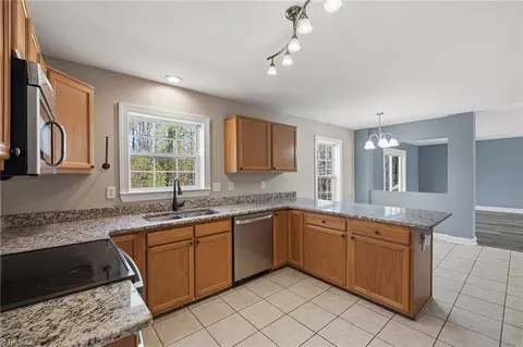 Kitchen - 193 Red Hawk Ln, Olin, NC 28660 photo 2 of 3