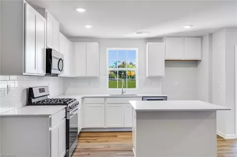 Kitchen - 216 Plumtree Ct, King, NC 27021 photo 2 of 4