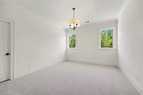 Bedroom - 7685 Manderley Dr, Oak Ridge, NC 27310 photo 2 of 8