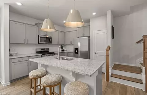 Kitchen - 1607 Eckert Ln, Whitsett, NC 27377 photo 1 of 2