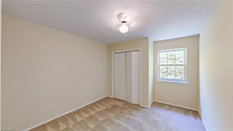 Bedroom - 2214 Shadow Valley Rd #E, High Point, NC 27265 photo 6 of 7