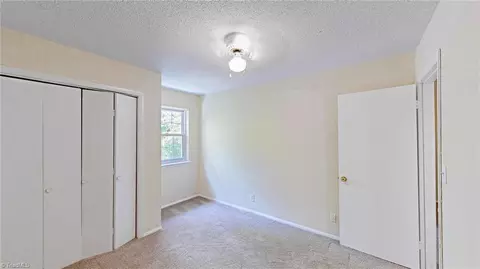 Bedroom - 2214 Shadow Valley Rd #E, High Point, NC 27265 photo 7 of 7