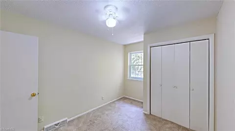 Bedroom - 2214 Shadow Valley Rd #E, High Point, NC 27265 photo 5 of 7