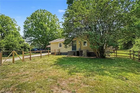 Exterior - 8124 Harrell Rd E, Oak Ridge, NC 27310 photo 7 of 10