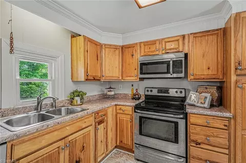Kitchen - 8124 Harrell Rd E, Oak Ridge, NC 27310 photo 3 of 4
